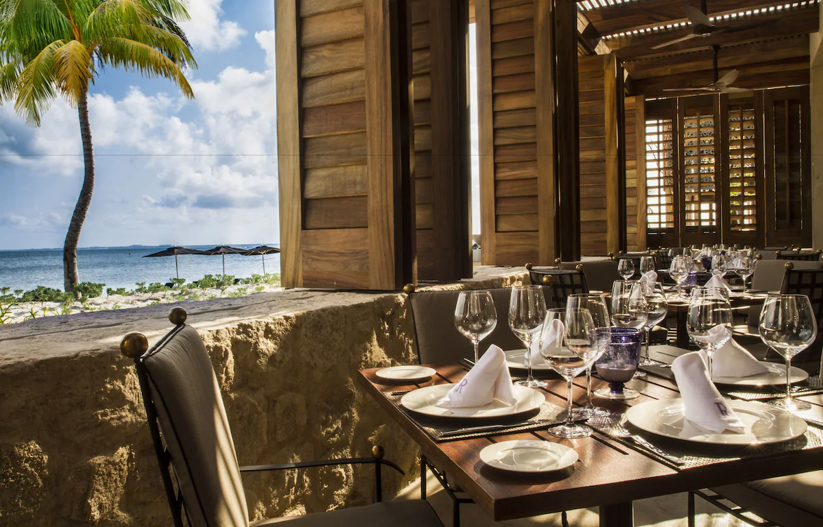 Beachfront restaurant terrace at NIZUC Resort & Spa