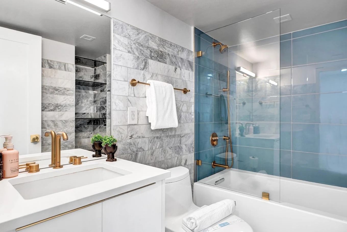 Marble bathroom with brass fixtures