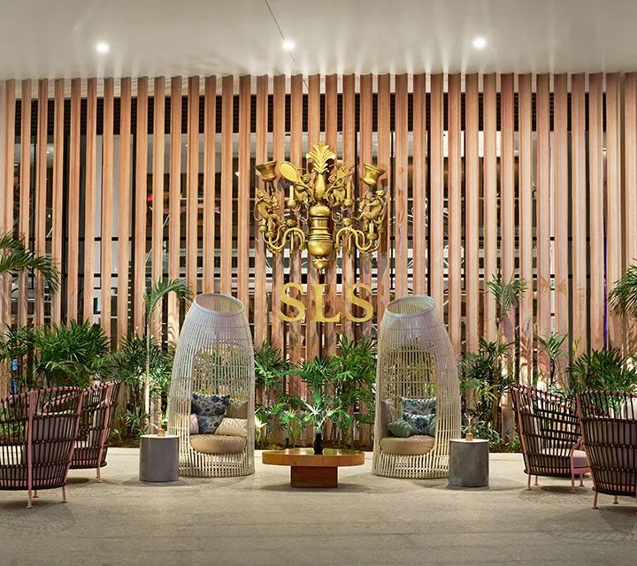 Grand lobby at SLS Playa Mujeres with signature chandelier